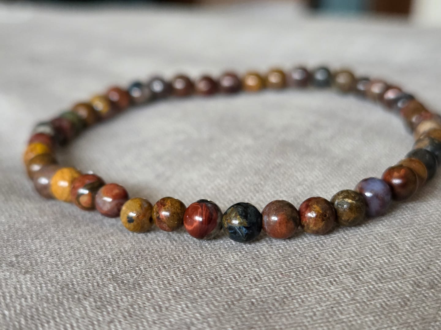 Customer photo review of Pulsera Pietersita  | 4mm | Escudo protector - Límites personales