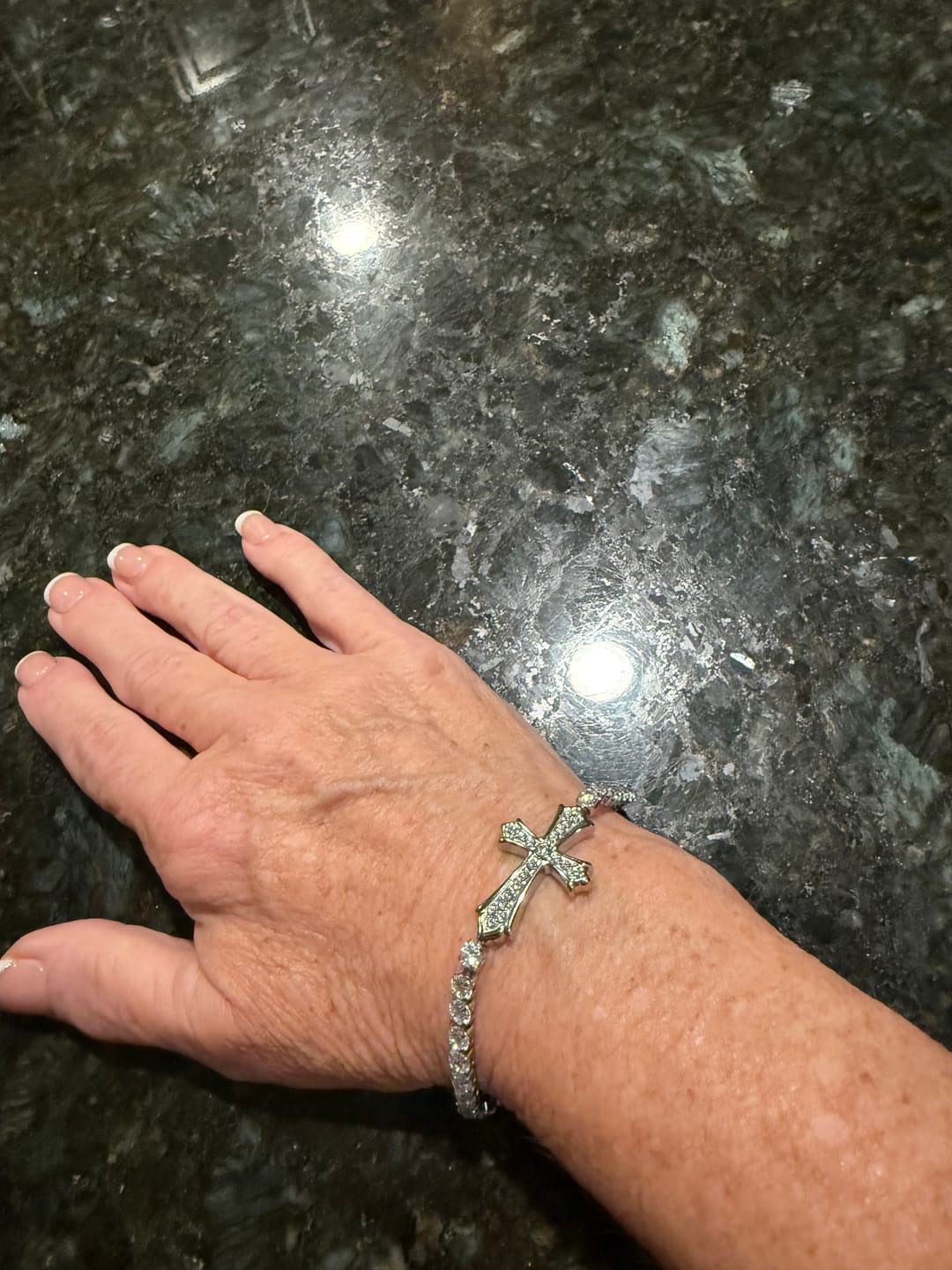 Customer photo review of FREE Today: 2-Color Elegant Zircon-Encrusted Cross Bracelet: A Symbol of Divine Grace & Elegance