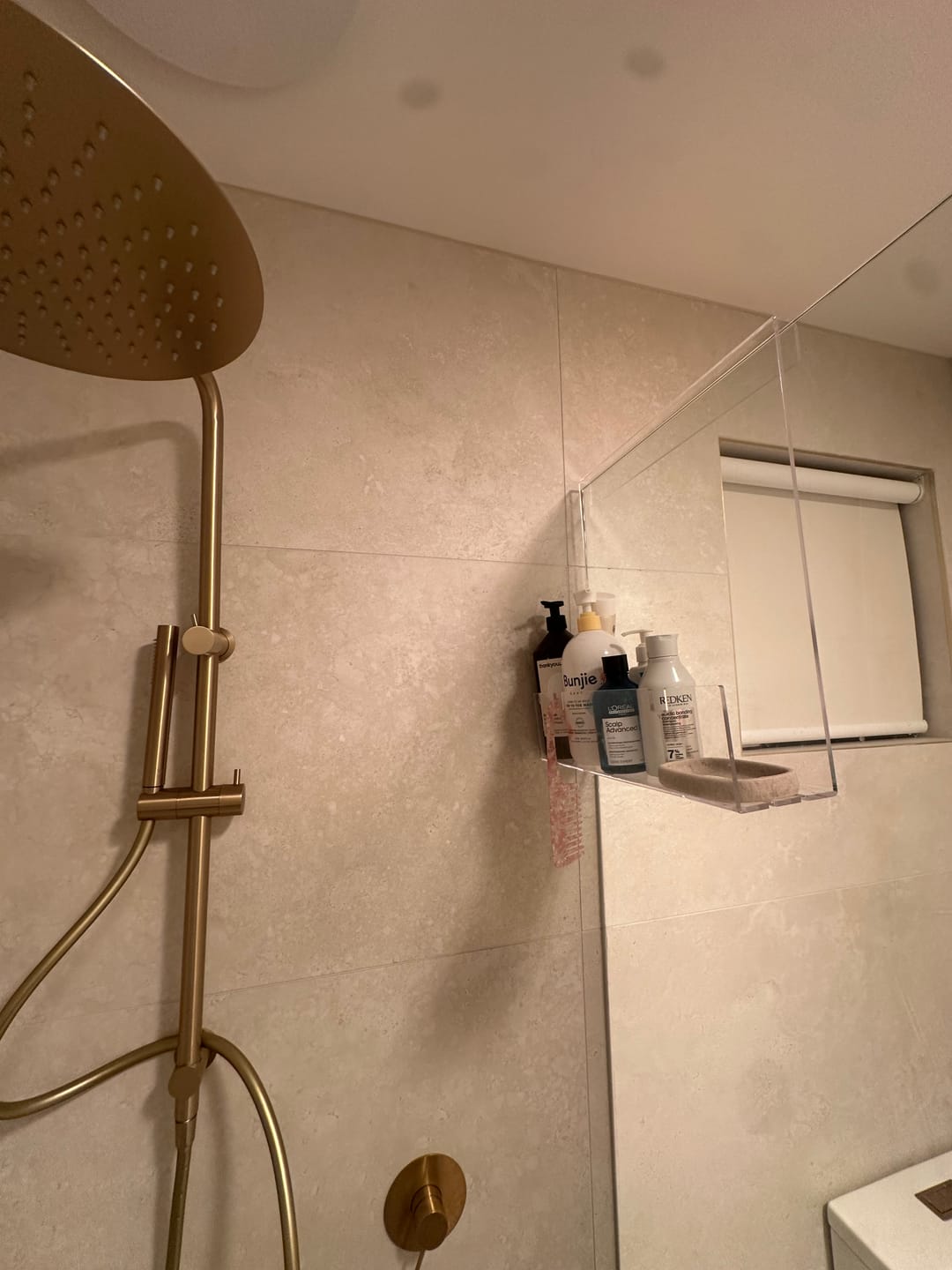 Customer photo review of Clear Acrylic Shower Shelf