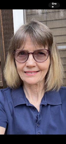 A customer's smiling selfie for their review of Blue Dream.