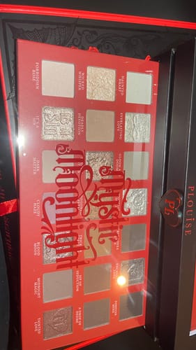 Customer's P. Louise 'Unholy Matrimony' eyeshadow palette with its top layer of neutral and shimmer shades open.