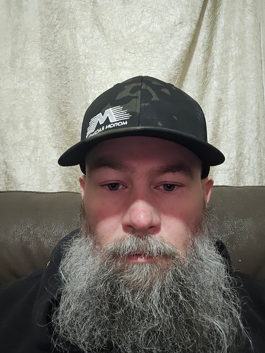 Customer photo review of Black Camo Flying M Snapback Hat
