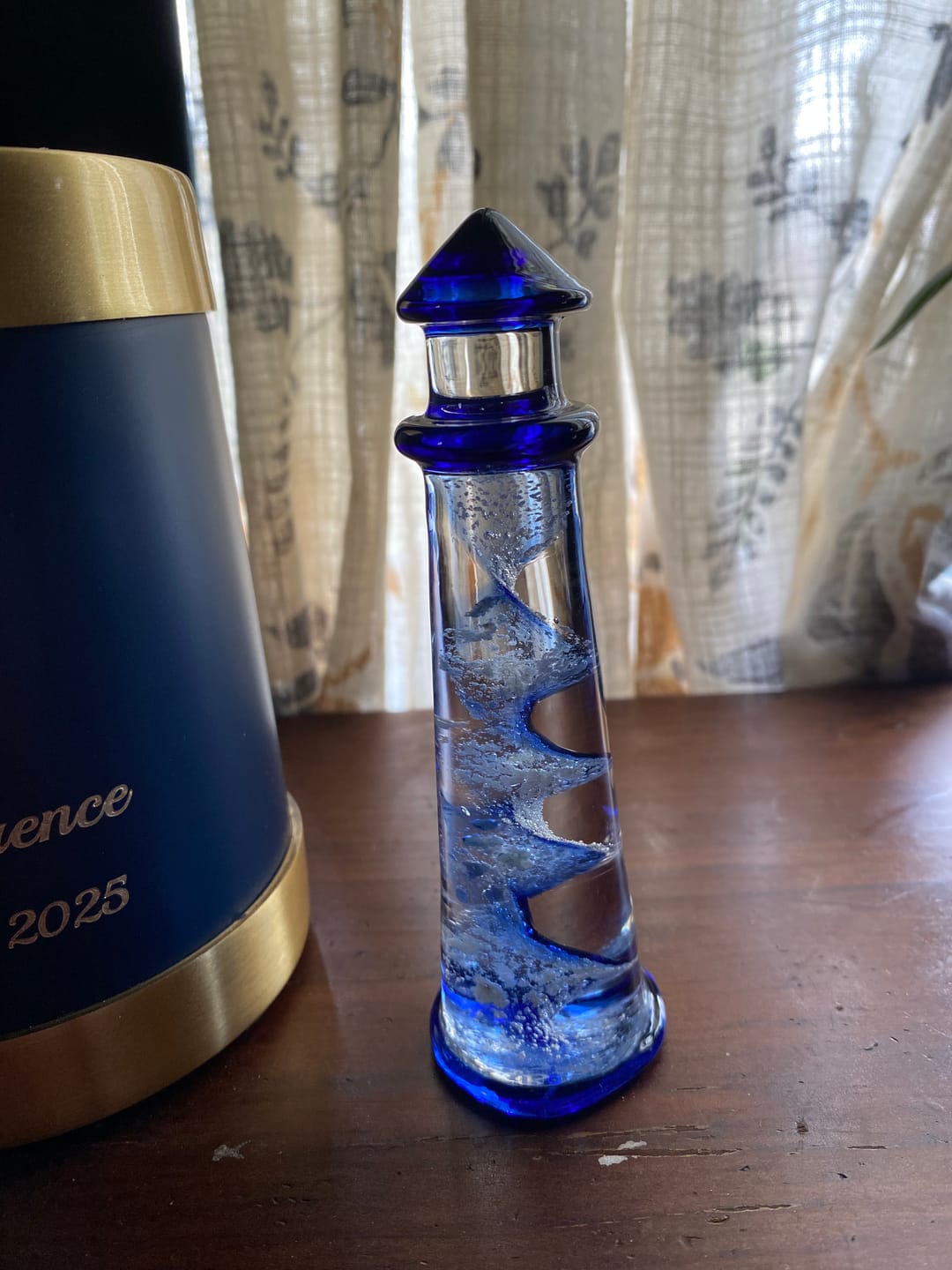 Customer photo review of Memorial Glass Lighthouse with Cremation Ashes