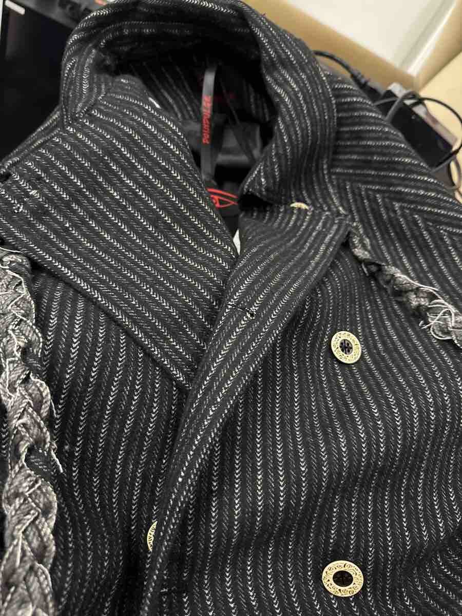 Customer photo review of DOINDULGE Deconstructed Herringbone Wool Long Coat