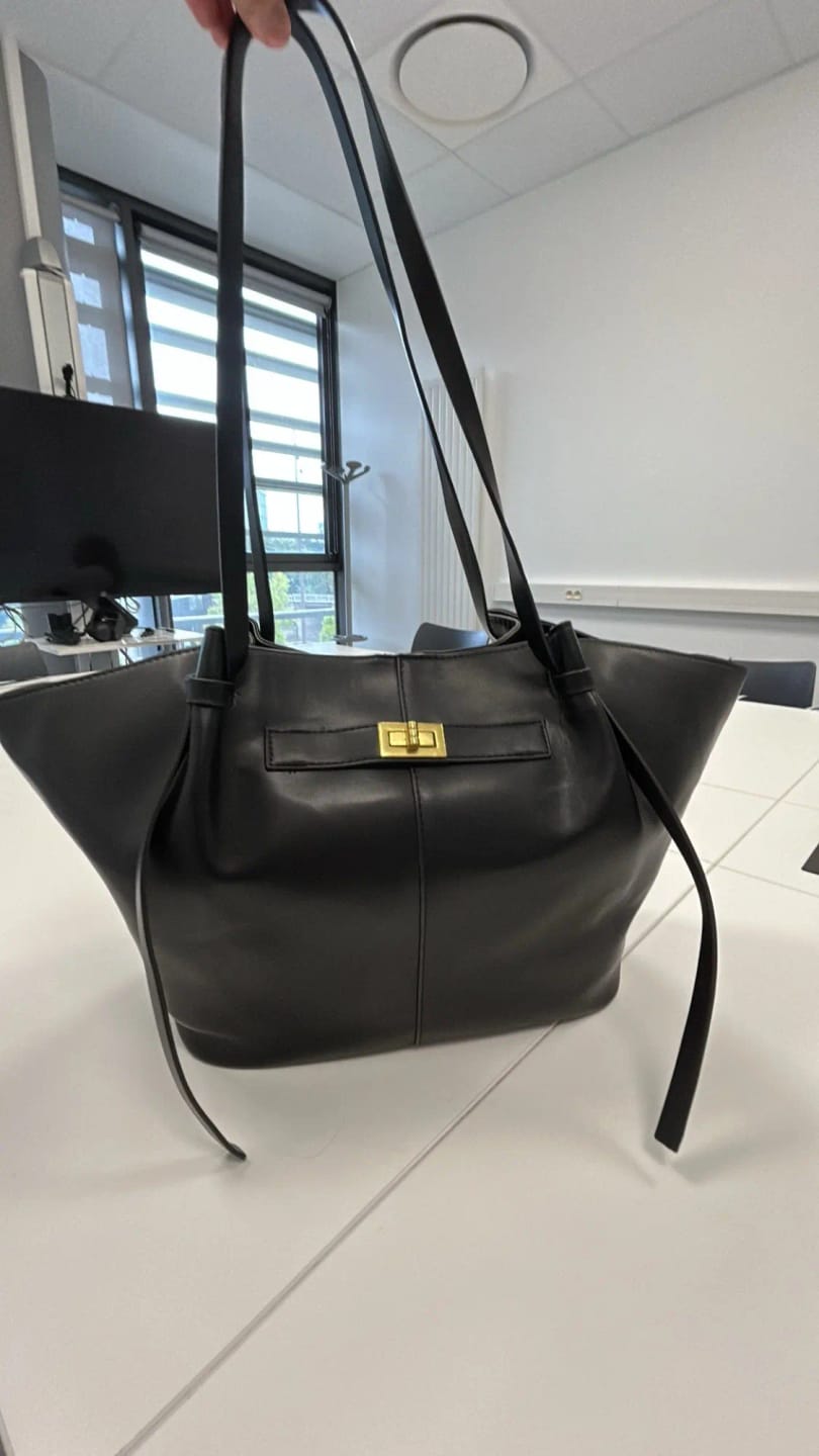 Customer photo review of Brianna Trapeze Shoulder Bag