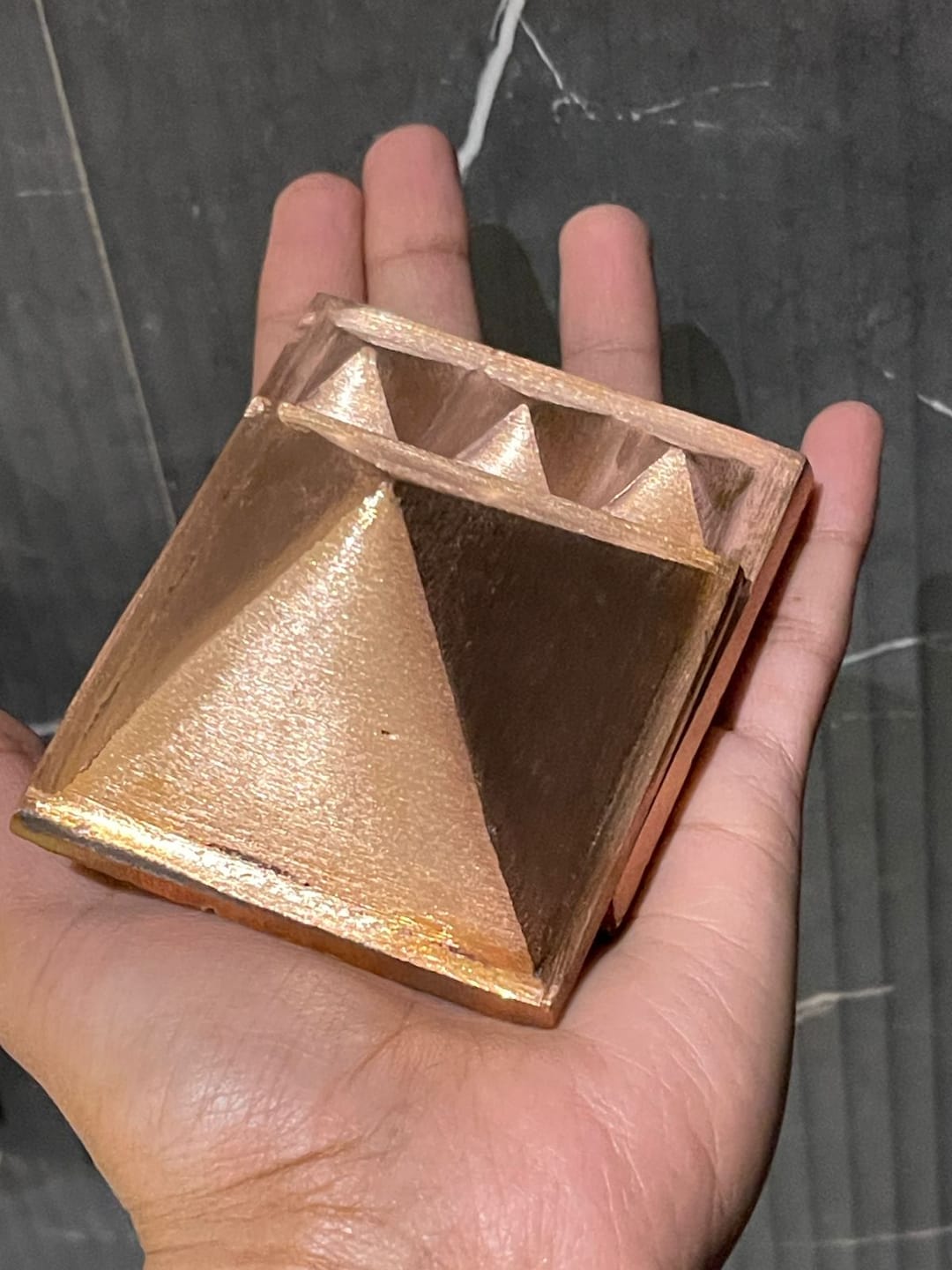 Customer photo review of 3-Layer Copper Pyramid Vastu Remedy for Energy Amplification, Prosperity and South East Direction Activation for Home, Office and Vastu Correction | 5-7.6 cm | 665 g
