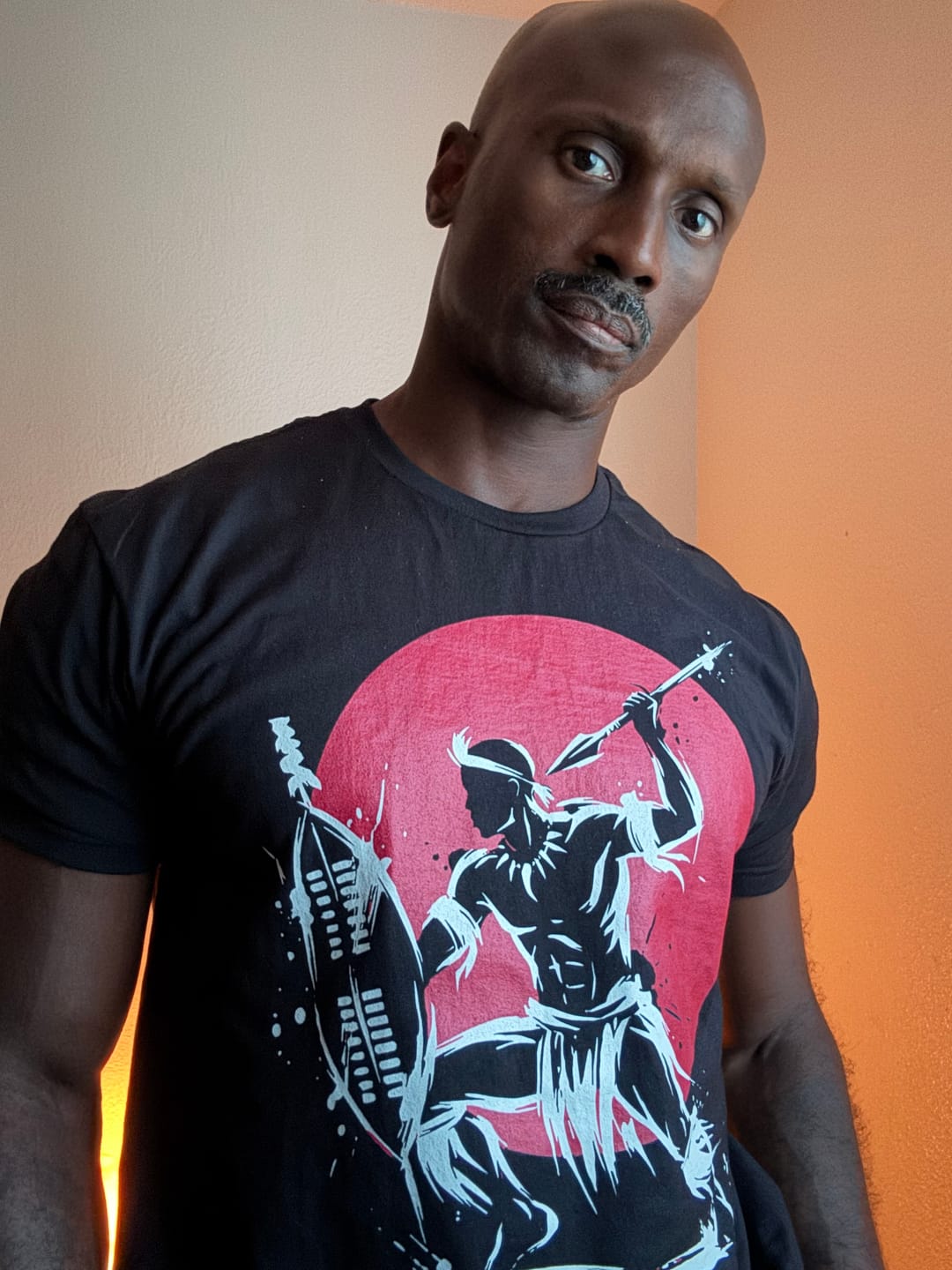 Customer photo review of Warrior Shield Red Sun Tee