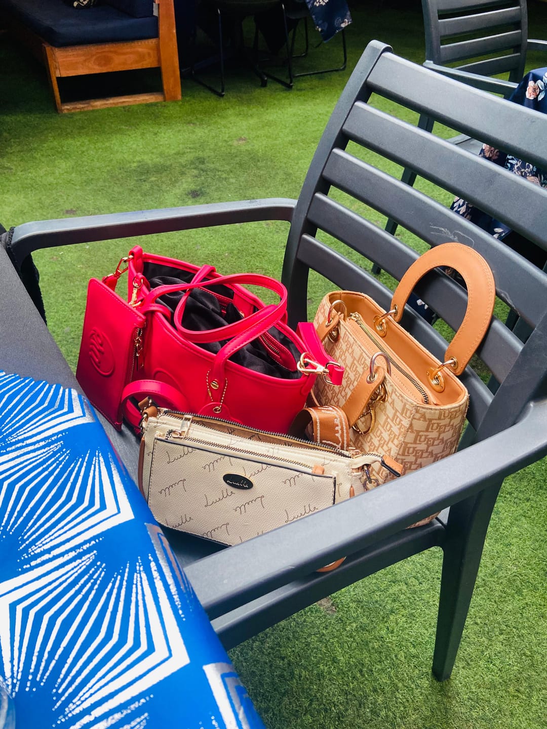 Customer photo review of ERA Mini Kisslock Chain Bag – Red