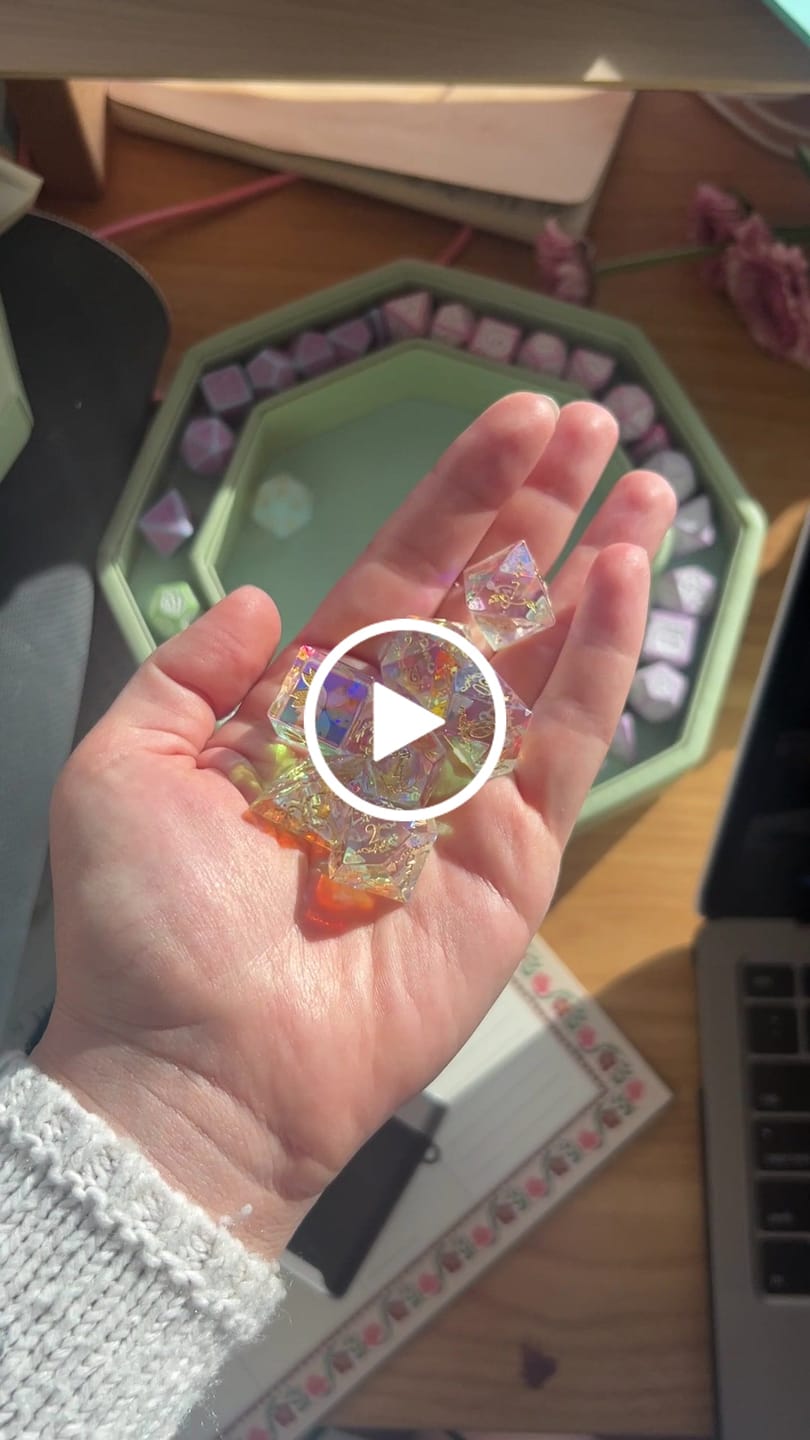 Customer video review of URWizards D&D Dichroic Prism  Glass Engraved Dice Set Unicorn Style