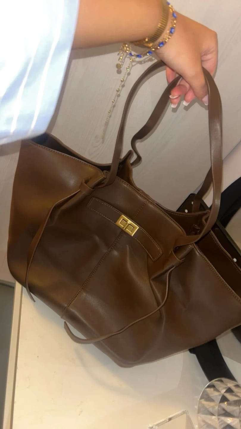 Customer photo review of Brianna Trapeze Shoulder Bag