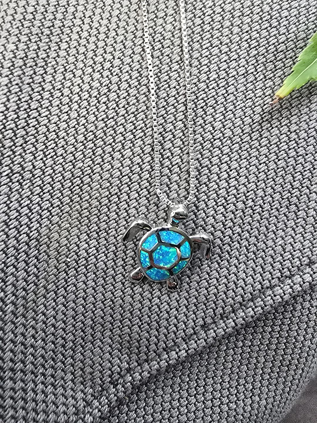 Customer photo review of Save the Sea Turtle Necklace