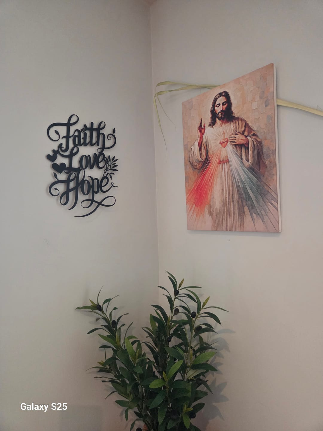 Customer photo review of Christianartworkshop Faith Love Hope Script Metal Wall Decor with Heart & Leaf Accents