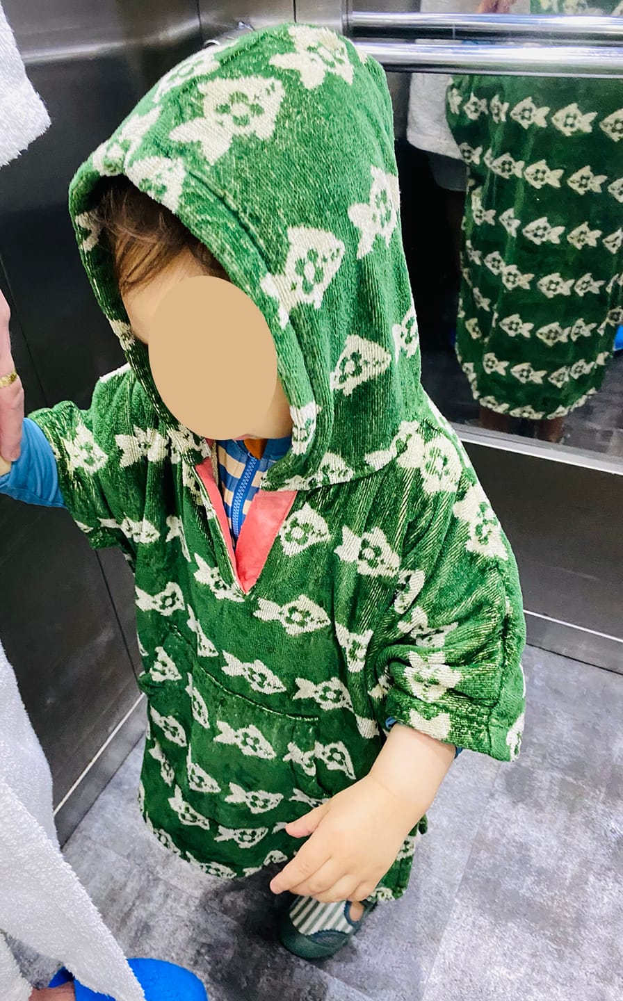 Customer photo review of Swimming Fish Kids Towel Poncho