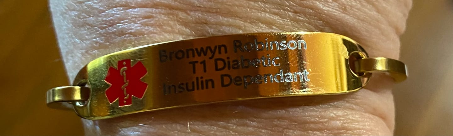 Customer photo review of Personalised Gold Medical Alert ID Bangle Bracelet
