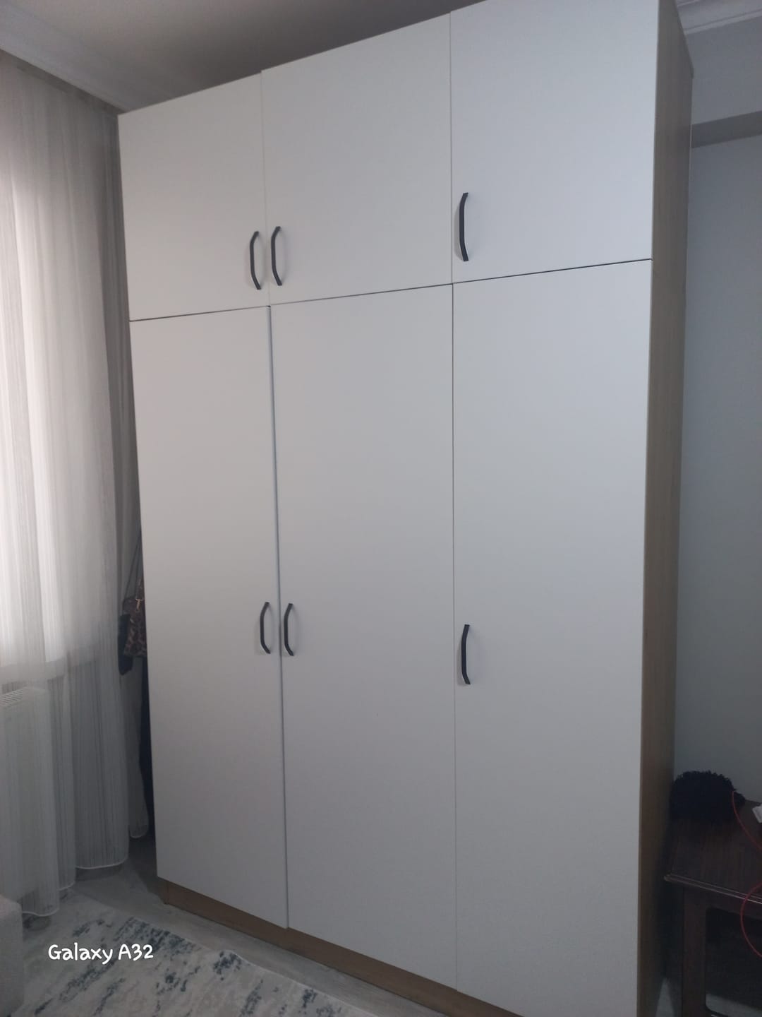 Customer photo review of Rani BA104 Yüklük 6 Kapaklı 10 Raflı Yatak Yorgan Yastık Saklama Dolabı S. Ceviz - Beyaz
