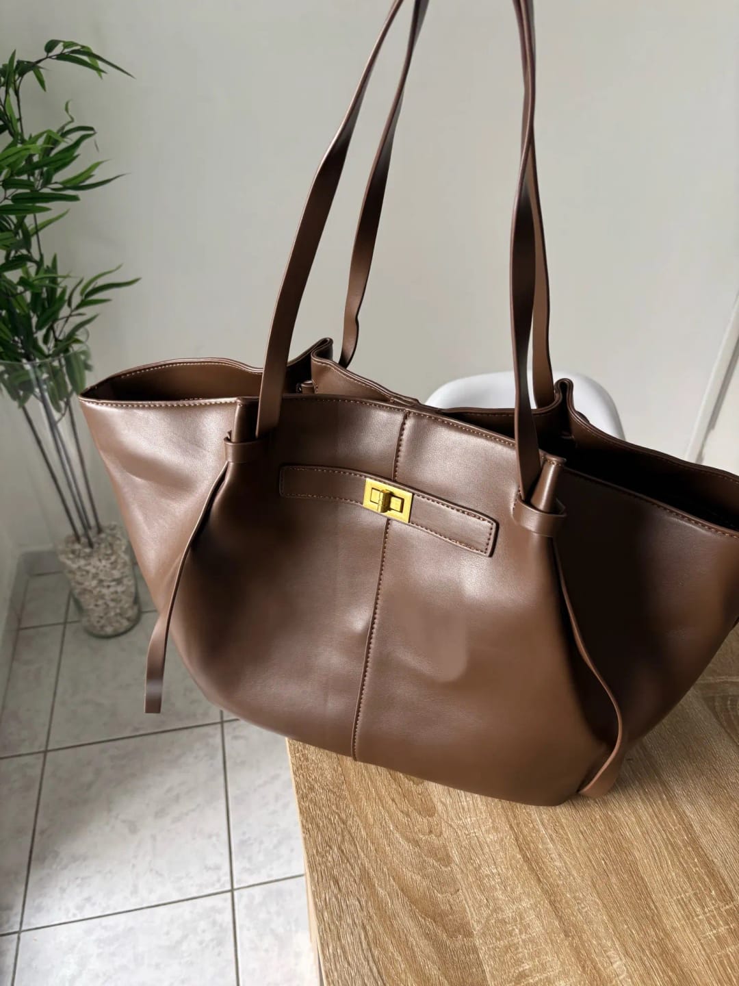 Customer photo review of Brianna Trapeze Shoulder Bag