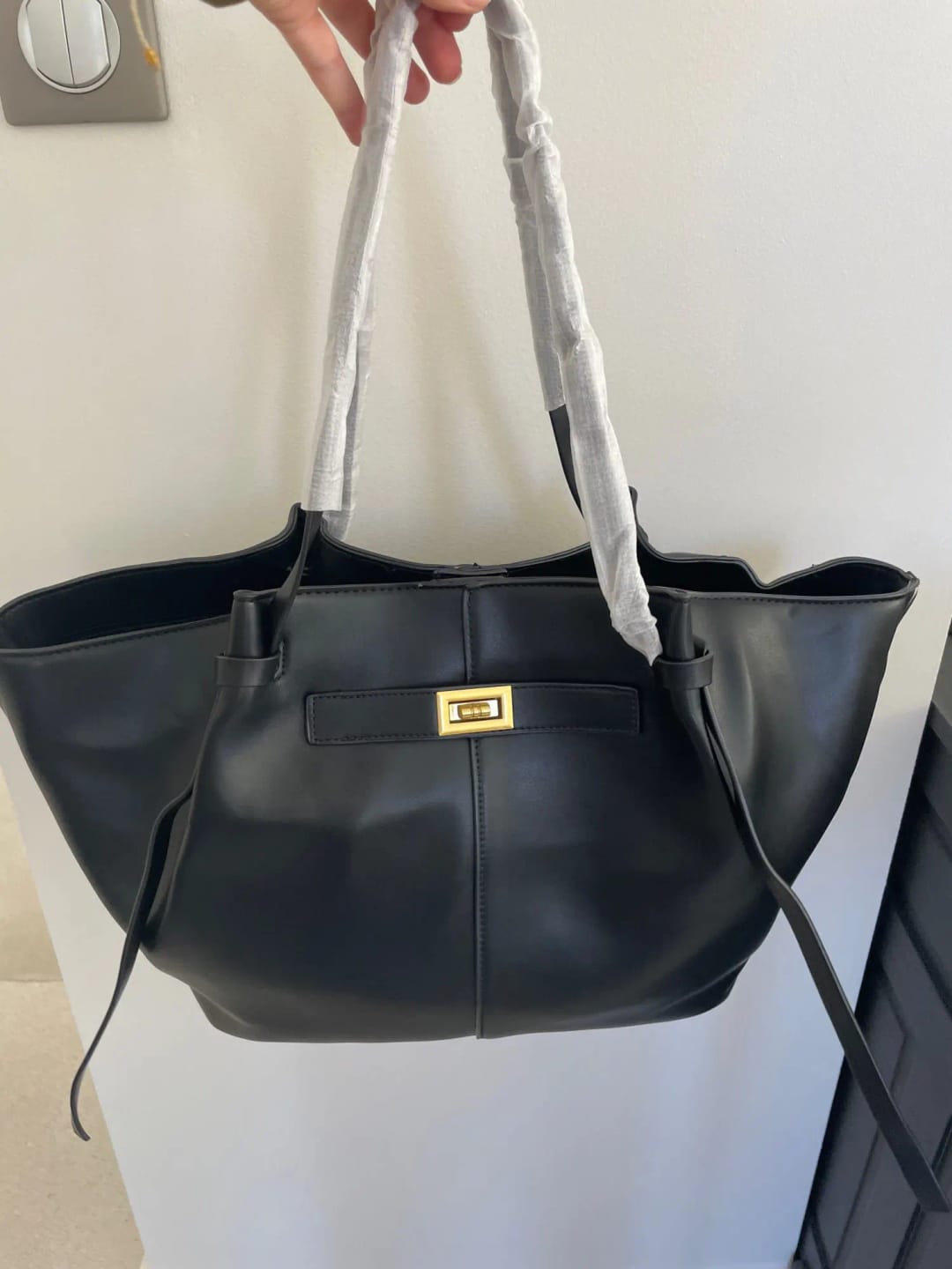 Customer photo review of Brianna Trapeze Shoulder Bag