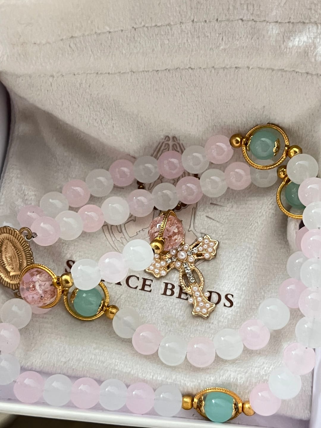 Customer photo review of SolaceBeads Artistic Pink & White Beaded Rosary: A Fusion of Colors & Sacred Symbols