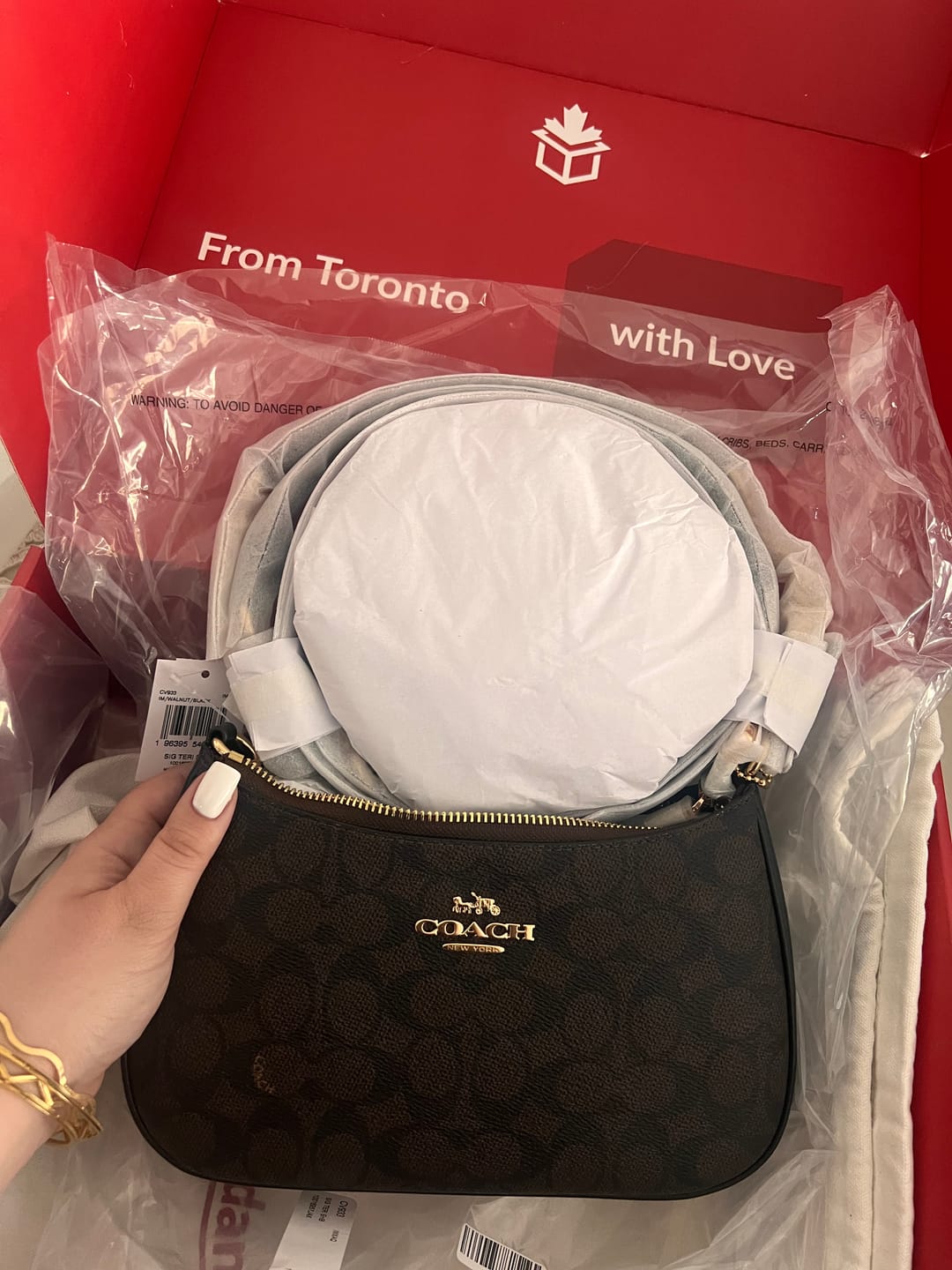 Customer photo review of Coach Women's Teri Shoulder Bag In Signature Canvas Gold/Walnut/Black