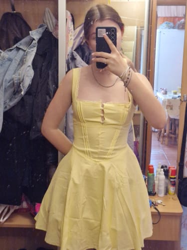 Customer photo review of Beatrice Retro Plunge Mini Dress