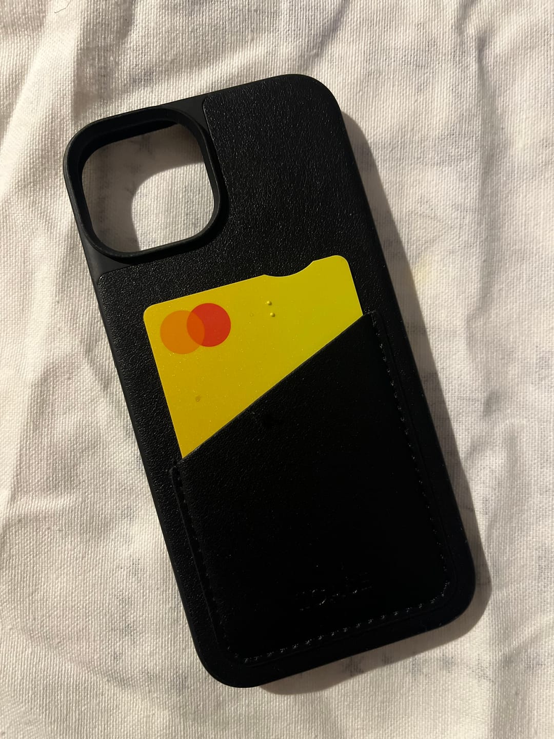 Customer photo review of Premium Genuine Leather Slim Back Card Slot iPhone Case