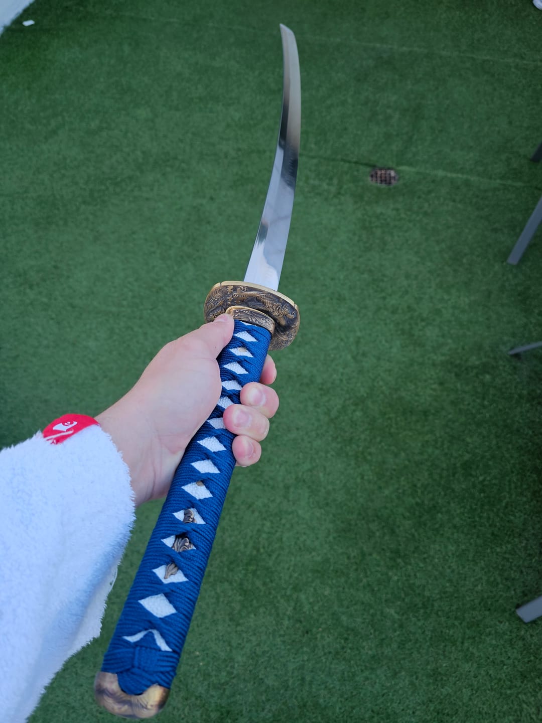 Customer photo review of The Rakki Koi  Handmade Katana Clay Tempered T10 Steel