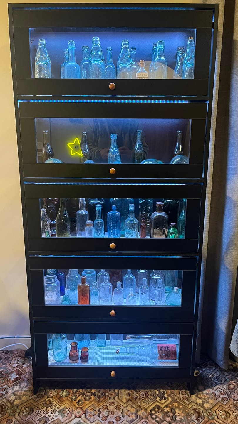 Customer photo review of Terra Display Cabinet with Flip-Up Glass Door & Lights – Black