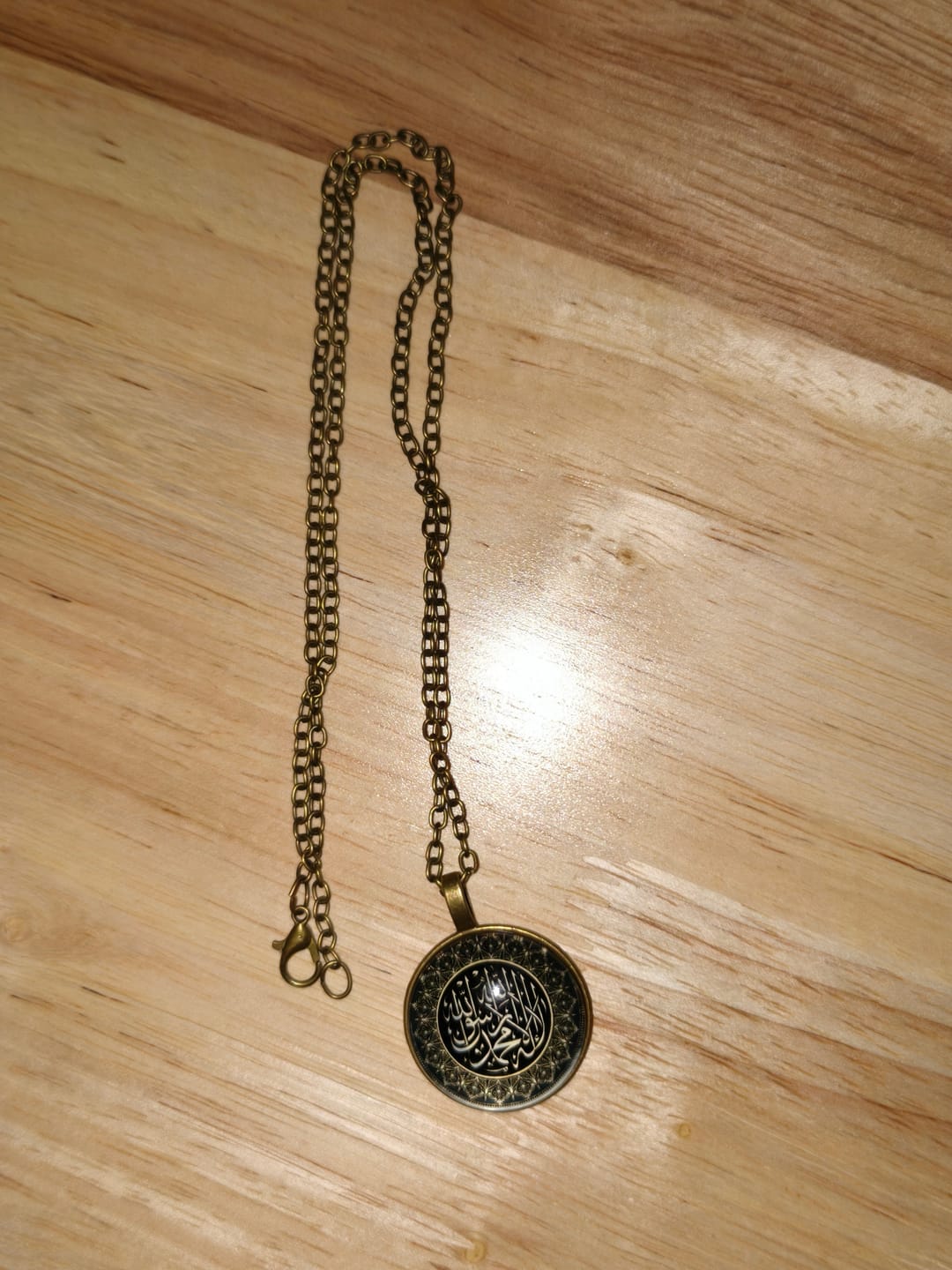 Customer photo review of HilalHaven Arc Wisdom Shahada Vintage Pattern Necklace