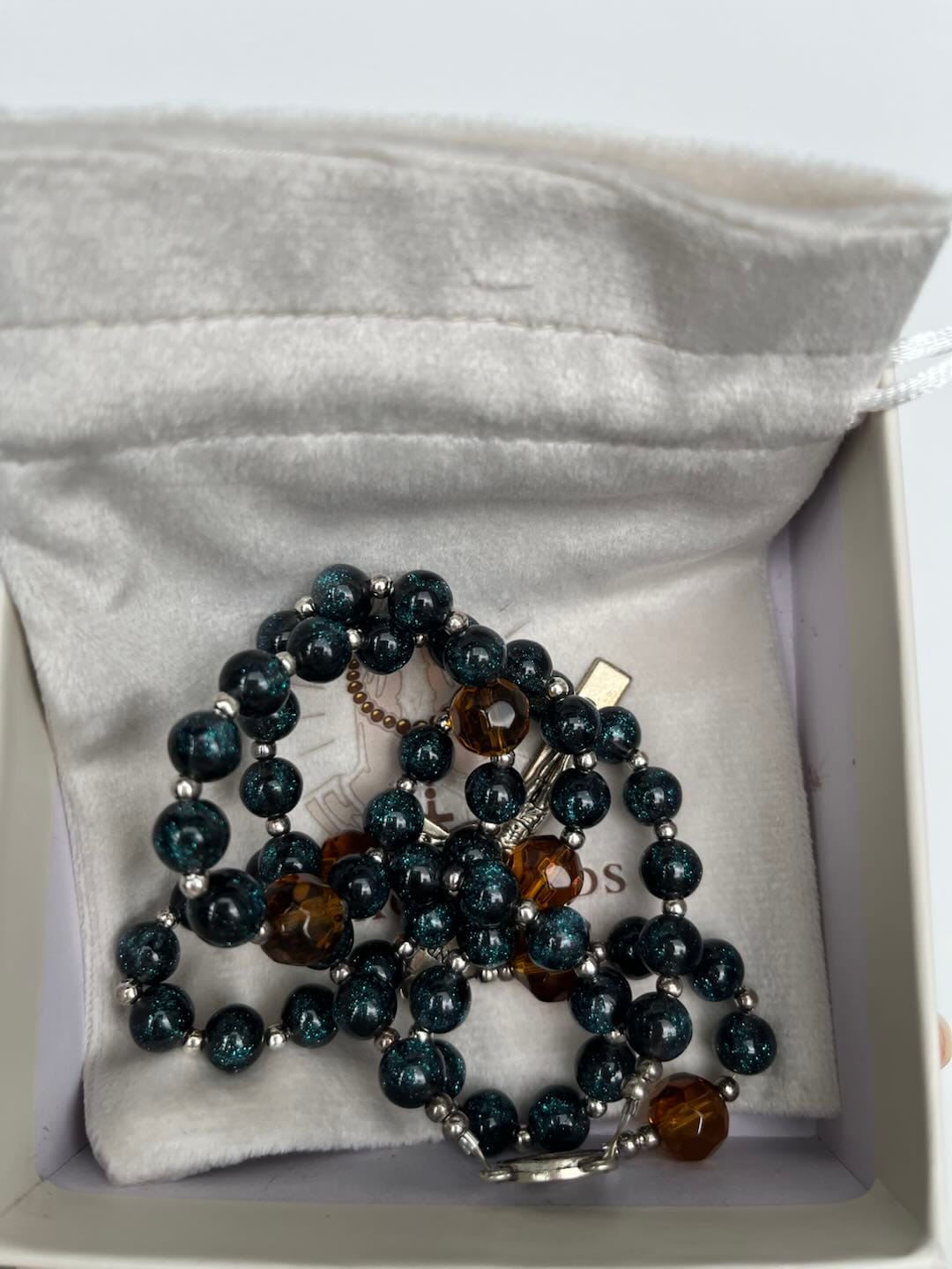 Customer photo review of SolaceBeads Starry Cat Eye & Amber Glass Beads Rosary: Starry Grace - San Nicolas Medal & Crucifix