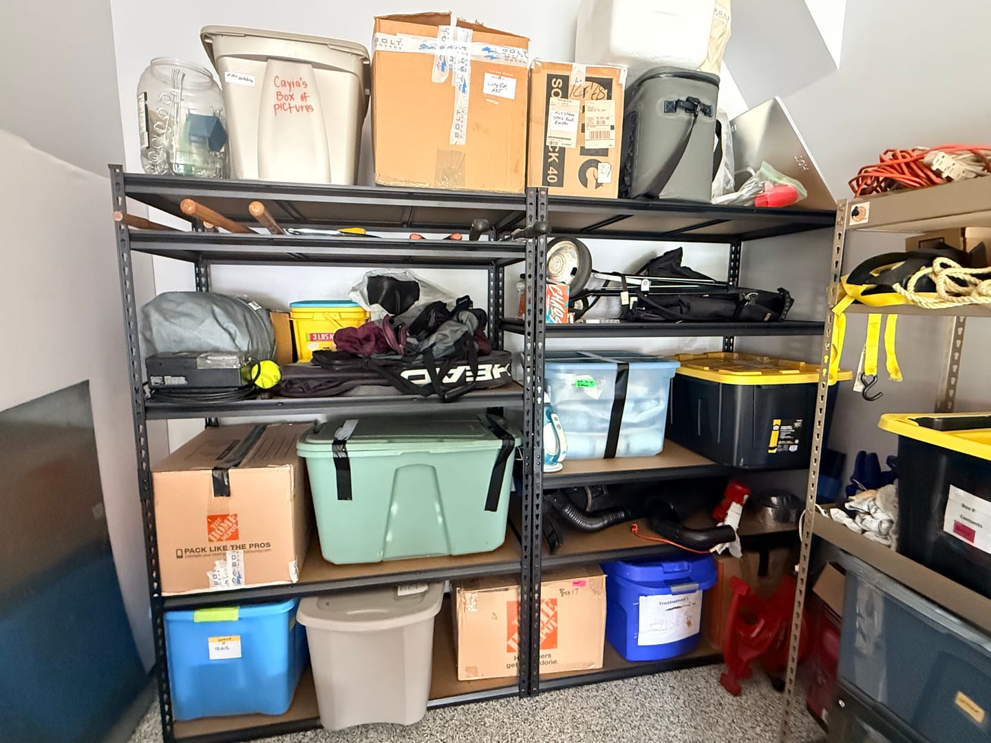 Customer photo review of Reibii 48.2" W x 24" D Heavy Duty Garage Shelving Units Load 3000LBS, Adjustable Steel Shelves for Garage Basement Warehouse