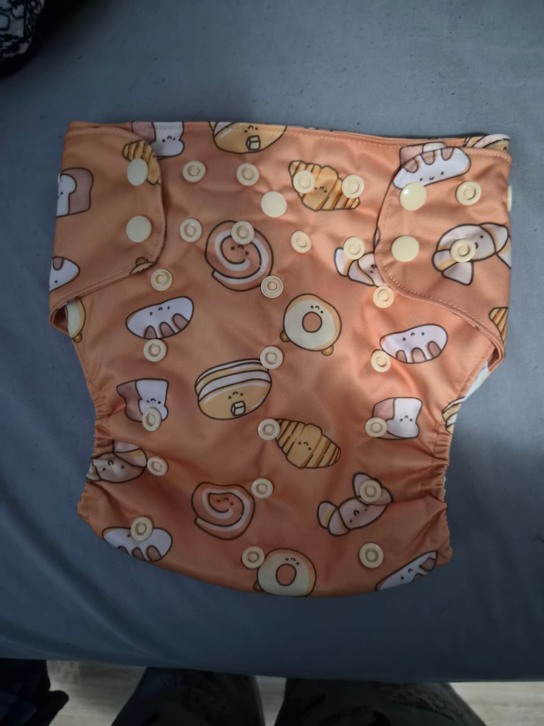 Customer photo review of Food: Essentials Pocket Cloth Diaper with Athletic Wicking Jersey, Grows with your Baby
