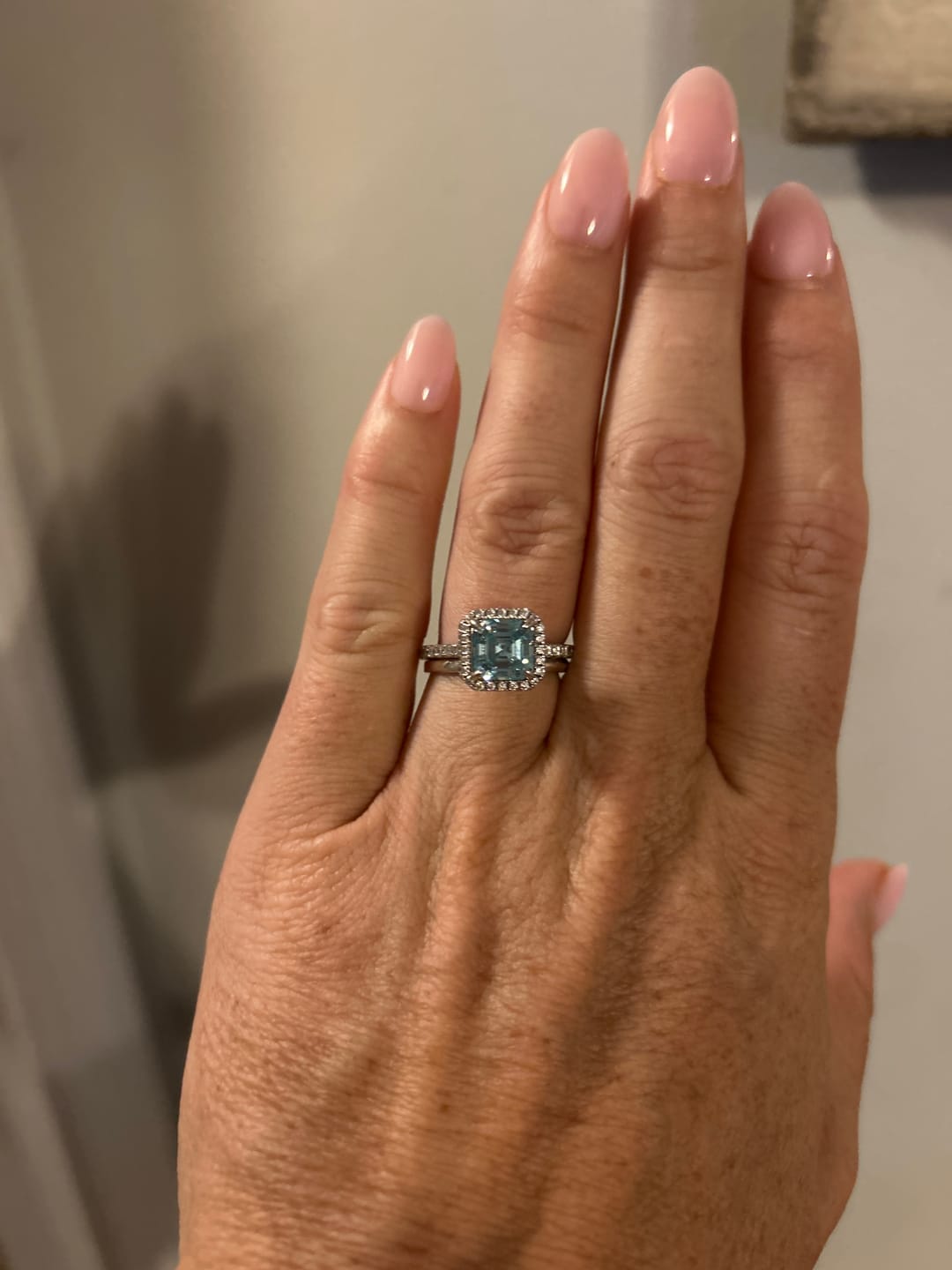 Customer photo review of Louily 2 Ct Exclusive Halo Asscher Cut Light Aquamarine Blue Engagement Ring