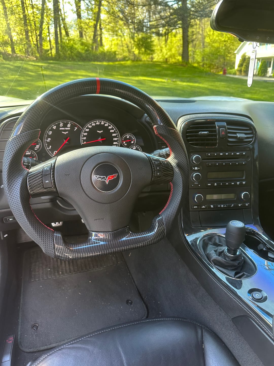 Customer photo review of Genuine Carbon Fiber Steering Wheel With Button Trim For C6 Corvette 2006-2011