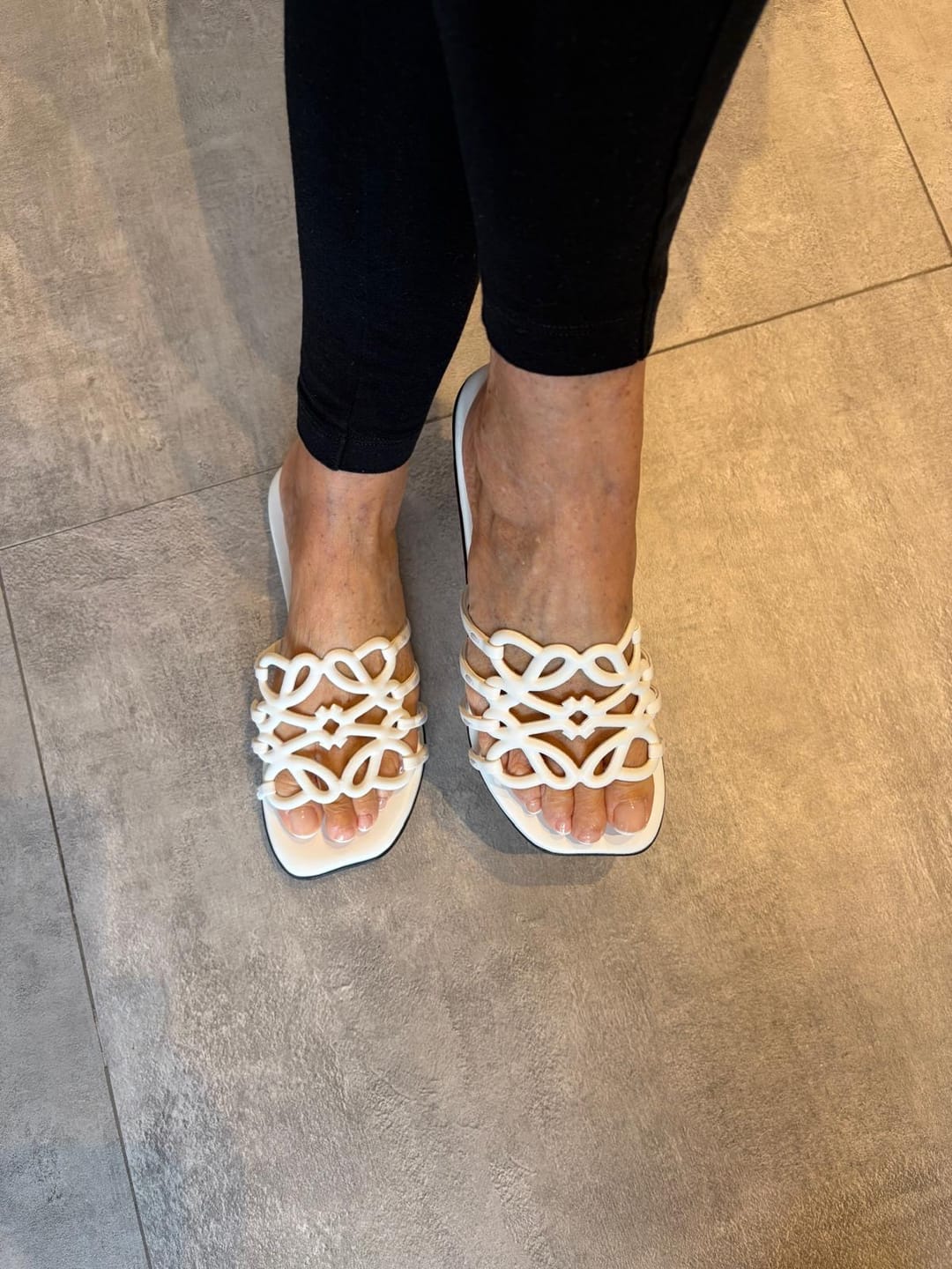 Customer photo review of Loewe 25 Petal Anagram Slides White Cowhide