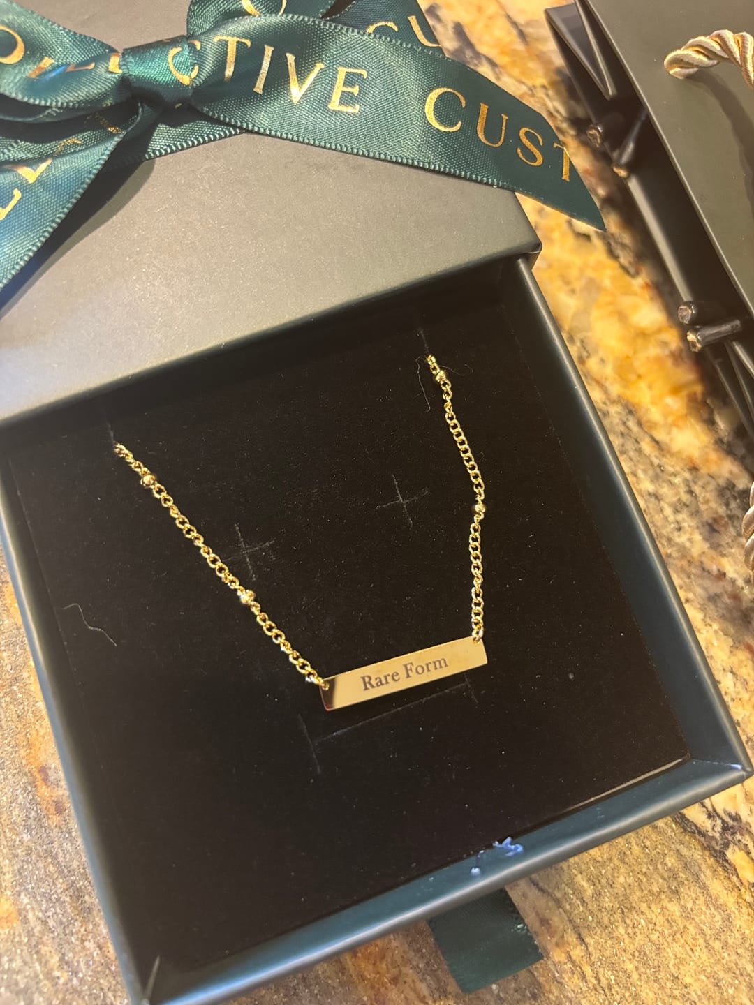 Customer photo review of Tiny Bar Necklace