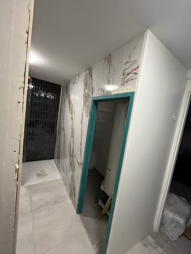 Customer photo review of Panneau Mural PVC Marbre Qatar – Veiné doré, Facile a Poser