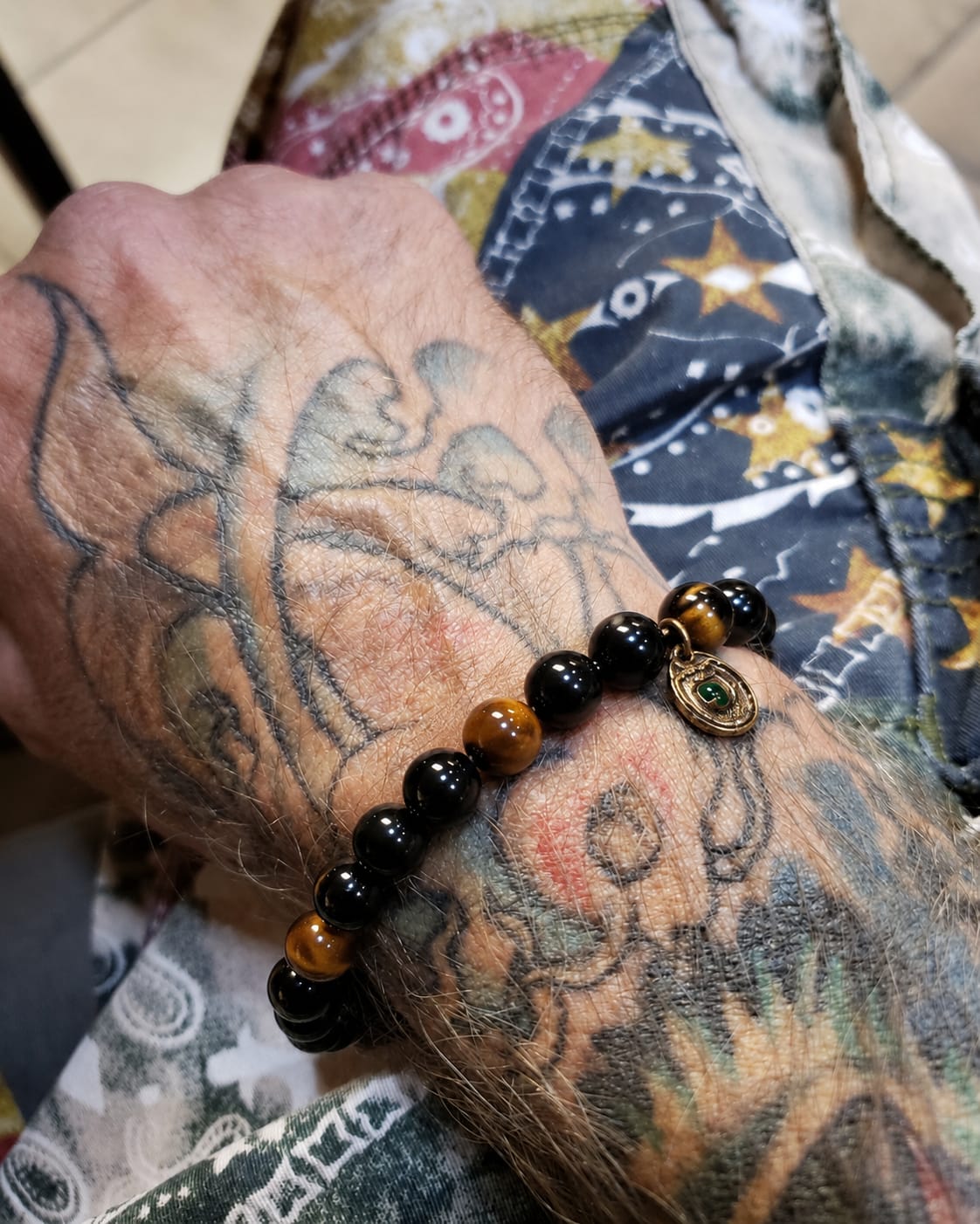 Customer photo review of Sovereign Warrior Array – Natural Golden Tiger's Eye & Silver Obsidian Bracelet