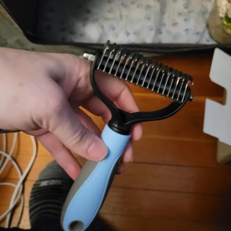 Customer photo review of Double-Sided Dog Dematting Comb & Deshedding Tool for Dogs & Cats