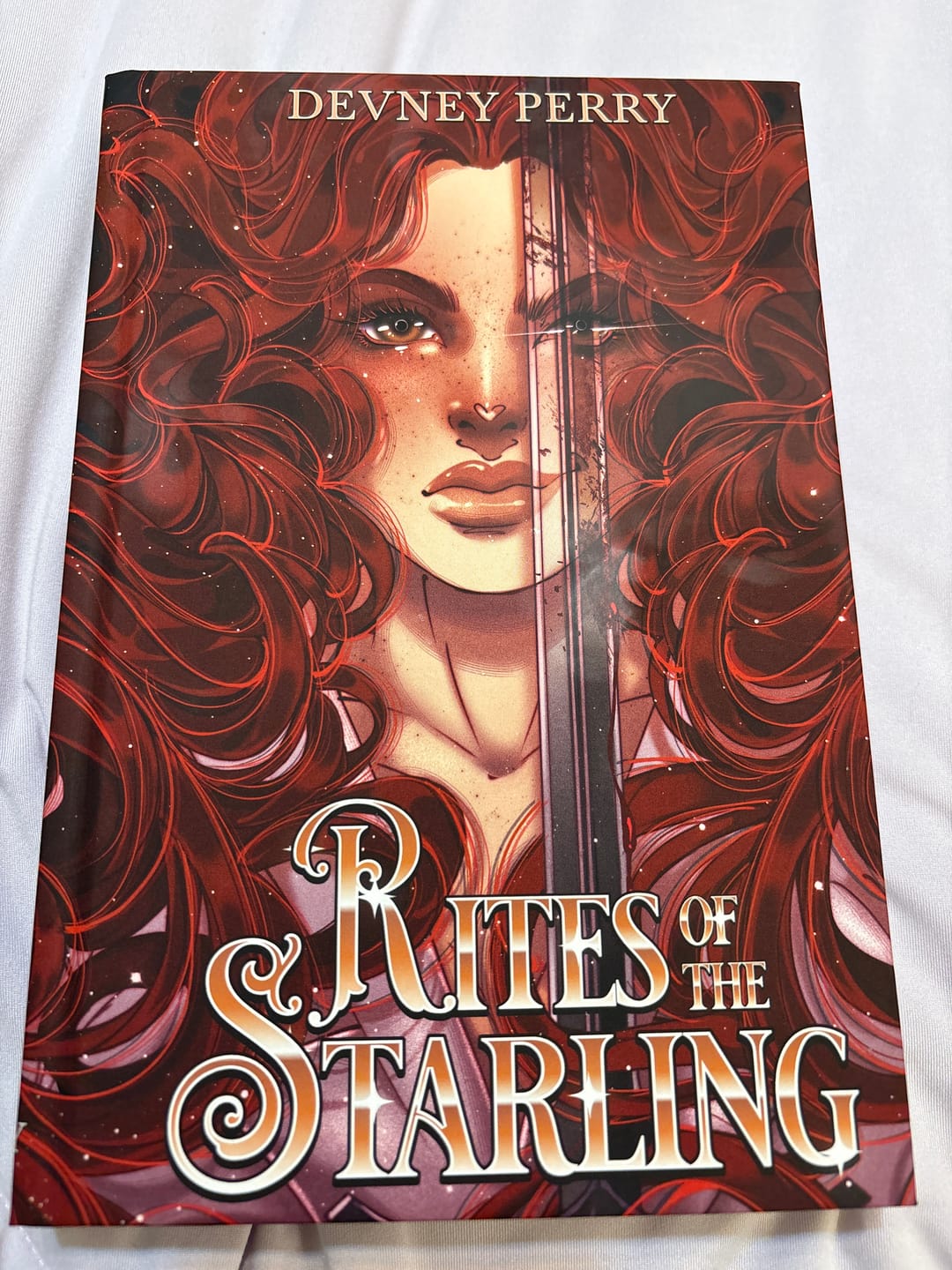 Customer photo review of PS Hardcover SE Rites of the Starling by Devney Perry