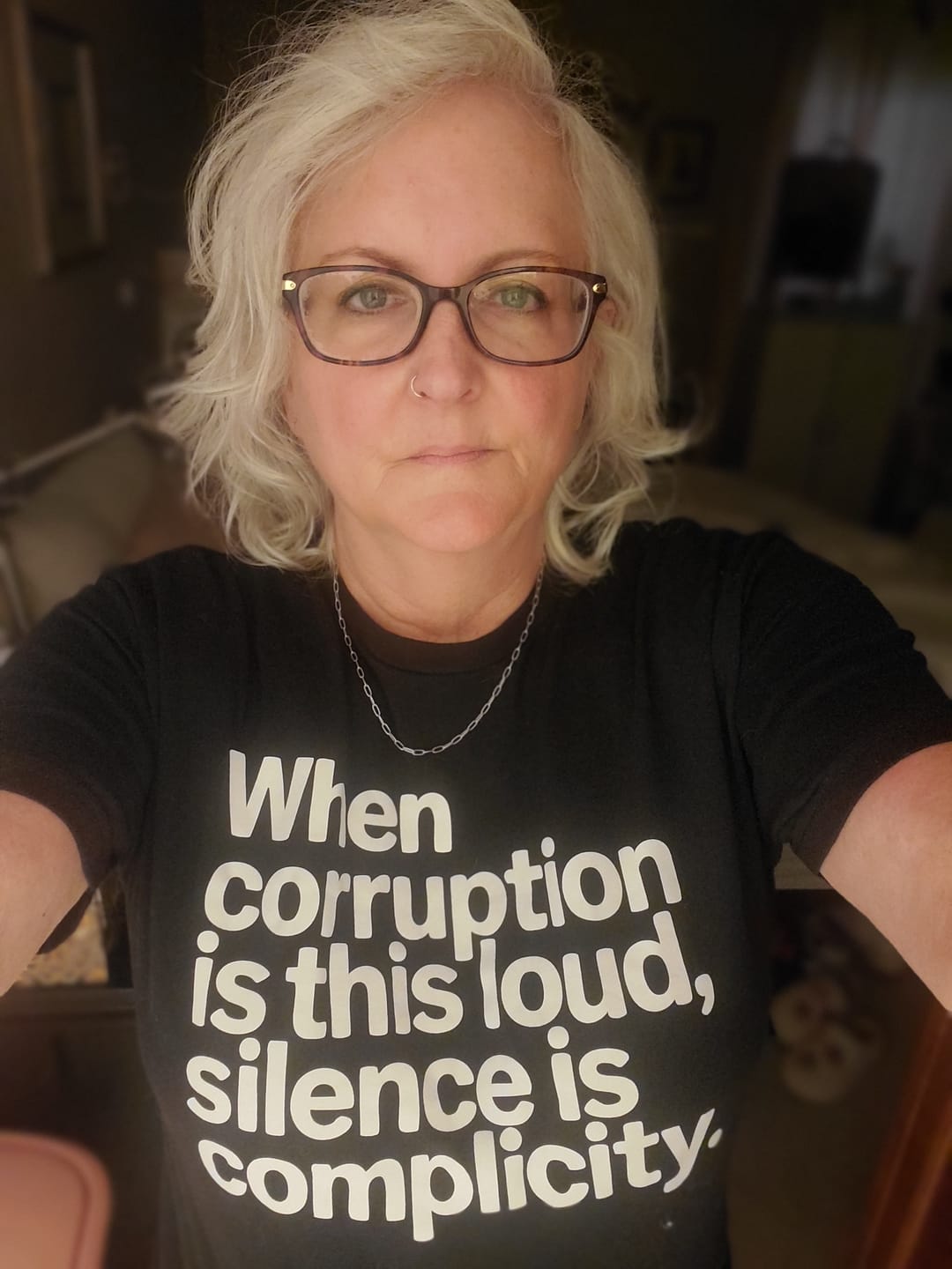 Customer photo review of When Corruption Is This Loud, Silence Is Complicity Unisex Tee