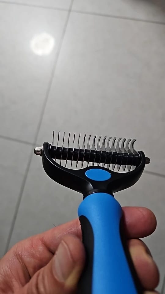 Customer photo review of Double-Sided Dog Dematting Comb & Deshedding Tool for Dogs & Cats