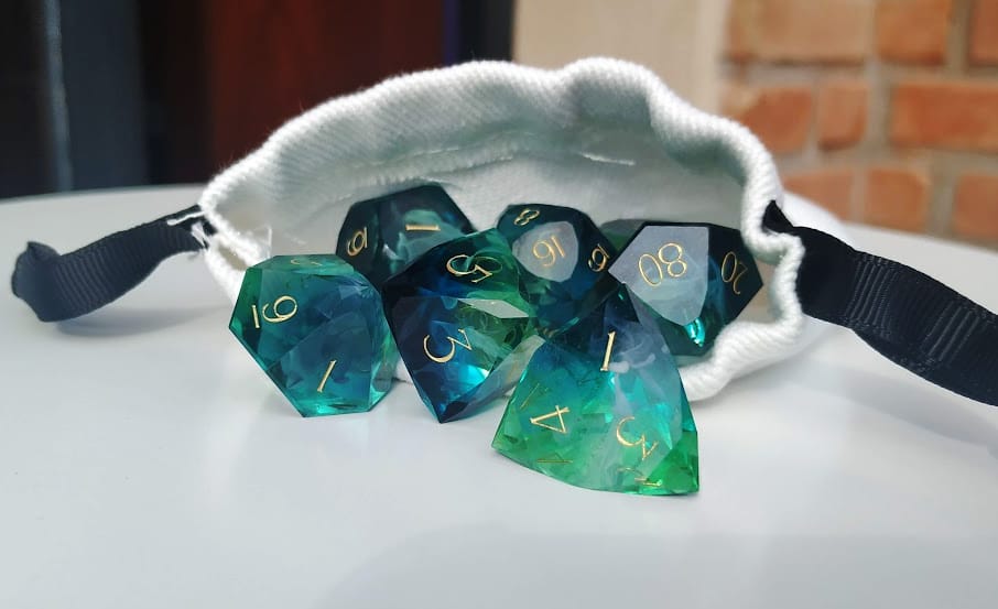 Customer photo review of URWizards D&D Resin Tidebound Fate Engraved Dice Set Multi-faceted Style