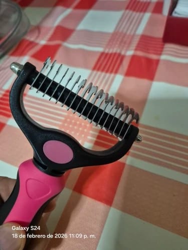 Customer photo review of Double-Sided Dog Dematting Comb & Deshedding Tool for Dogs & Cats