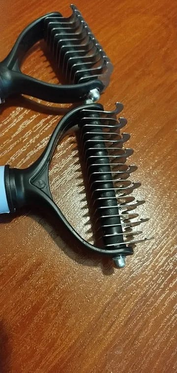 Customer photo review of Double-Sided Dog Dematting Comb & Deshedding Tool for Dogs & Cats