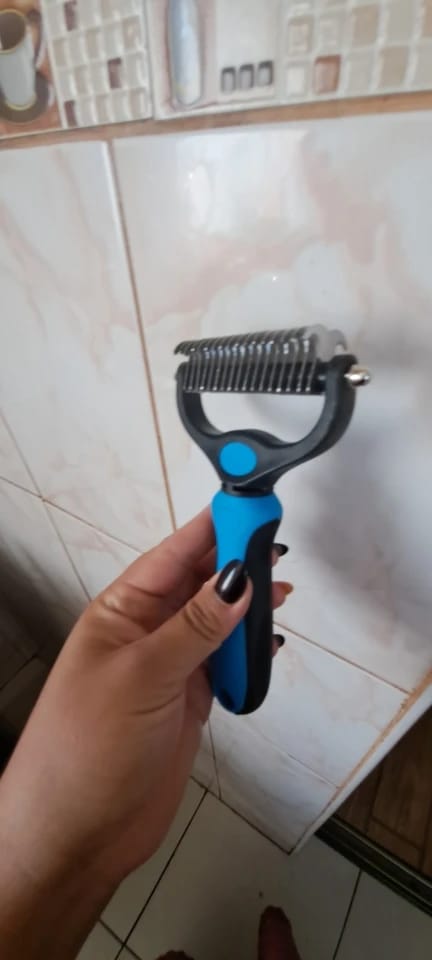 Customer photo review of Double-Sided Dog Dematting Comb & Deshedding Tool for Dogs & Cats