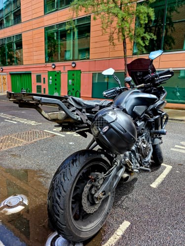 Rear view of a reviewer's motorcycle, where the KTM Indicator Holders are installed.