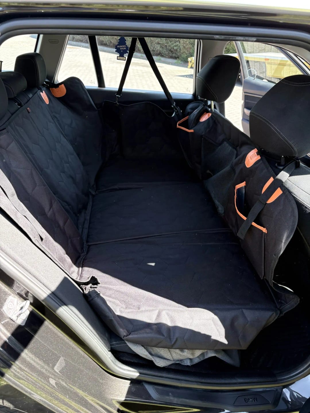 Customer photo review of Hard-Bottom Dog Car Seat Hammock — Steady Bed for Large & Senior Dogs