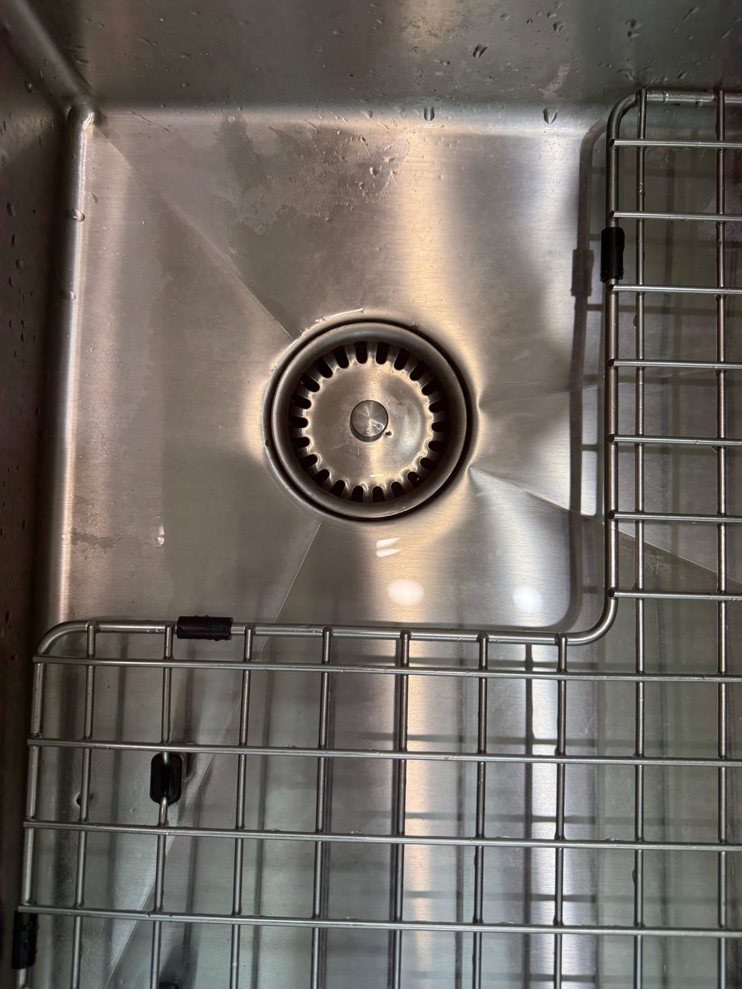 Customer photo review of Original smaller seal for strainer basket. Use if CGS Disposal Splash Guard is draining slow.