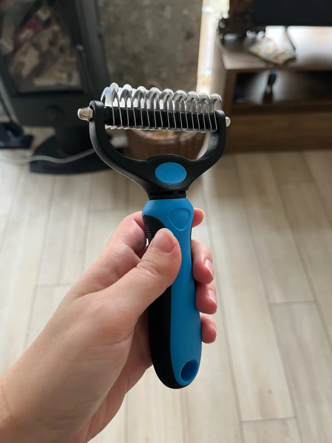 Customer photo review of Double-Sided Dog Dematting Comb & Deshedding Tool for Dogs & Cats