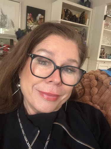 A reviewer's close-up selfie showing her face for the Koriderm™ Time Reverse Cream review.